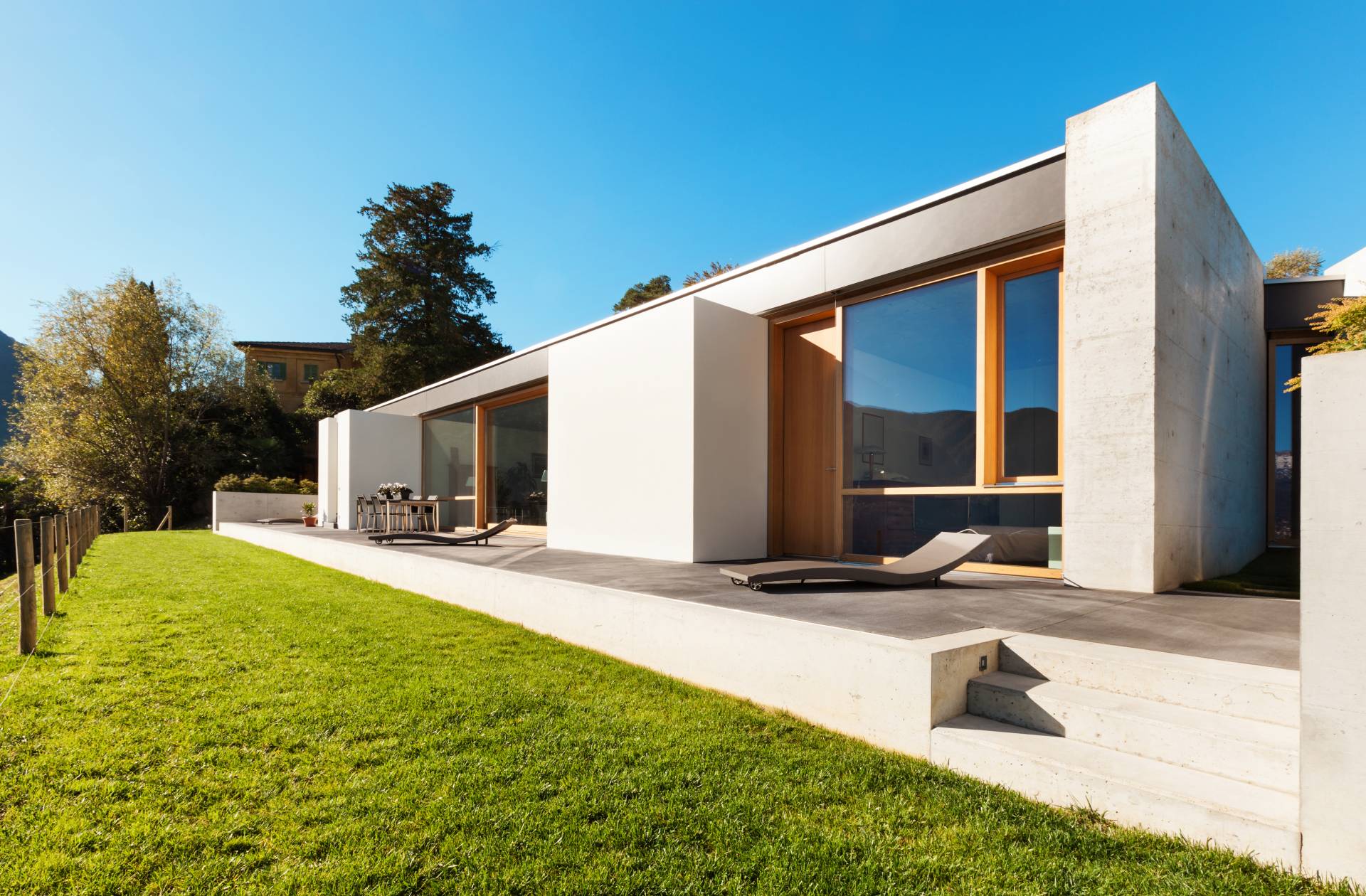 beautiful modern house in cement, view from the garden